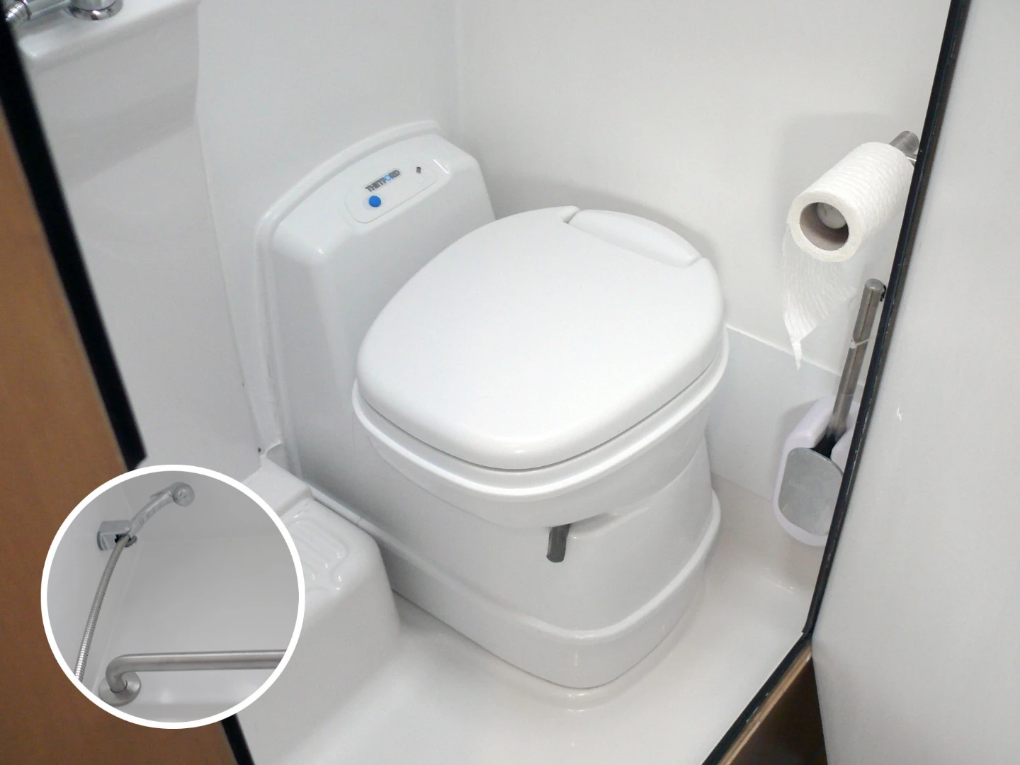 The rear wet bath compartment combines a toilet and shower