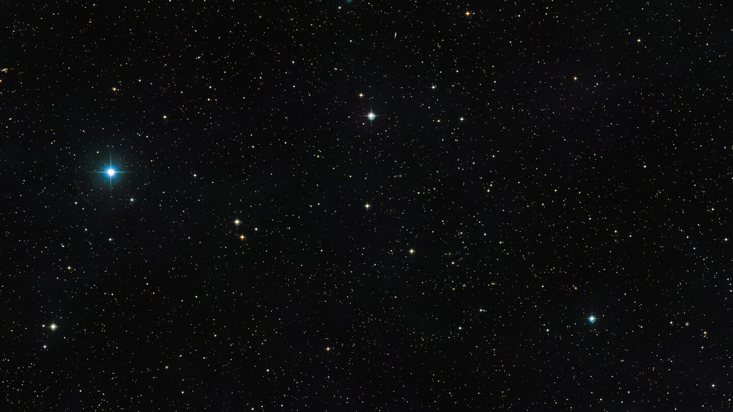 V471 Tauri is located at the center of this image, which itself was created using images in the Digitized Sky Survey 2 (Image: ESO/Digitized Sky Survey 2)