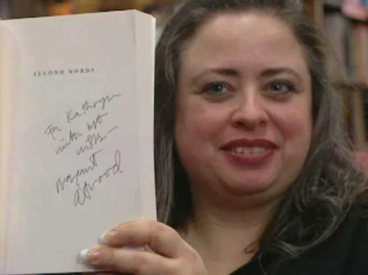 The end result - a happy fan with an inscribed book and memories of a face-to-face encounter with the author. Image by Unotchit.