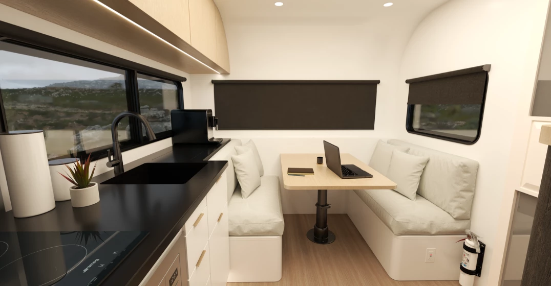 The Coast trailer seats four and sleeps two on its convertible dinette