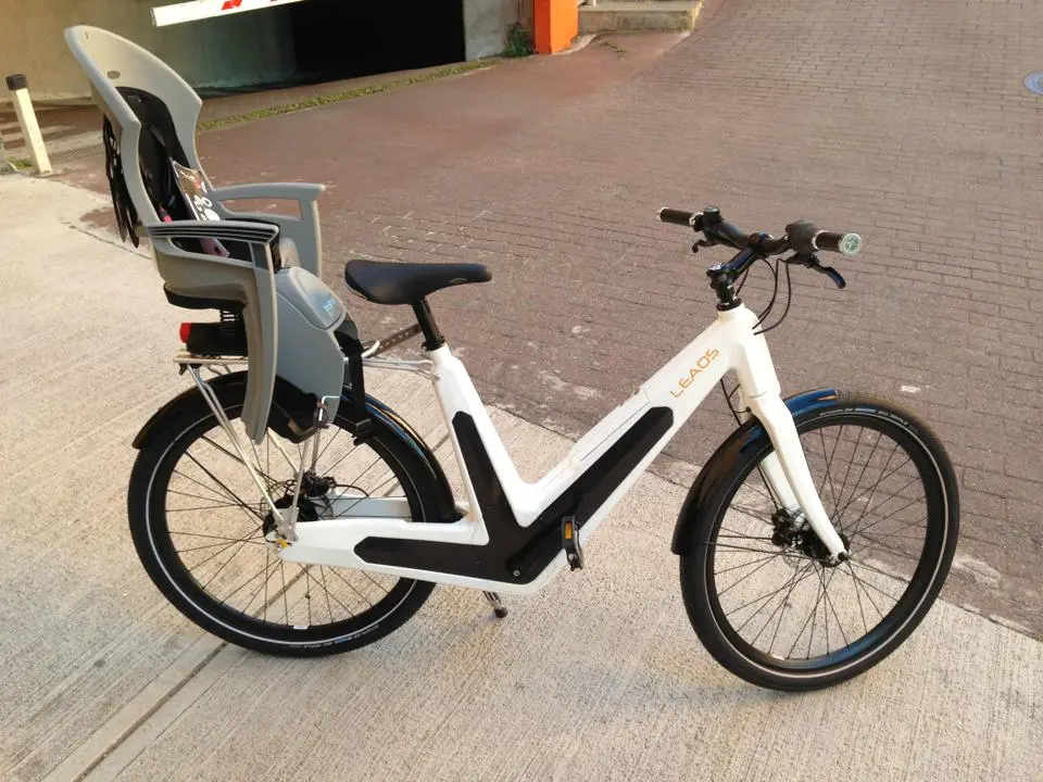 A Leaos e-bike fitted with a child seat