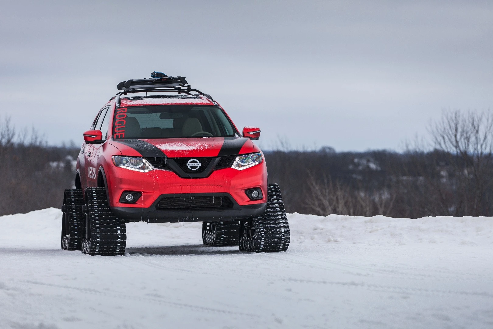 The Nissan Rogue Warrior, which originally debuted at the Montreal Auto Show last month and will appear at the Chicago show as the refreshed Rogue Winter Warrior, has 14.1 in (36 cm) of ground clearance and an 85-in (216-cm) track width