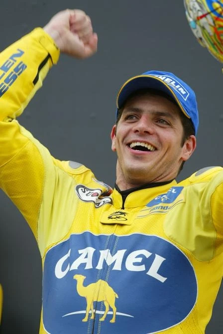 After two seasons and one race, Alex barros gets to stand on top of the podium again