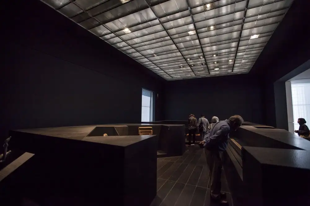 Visitors enjoy an exhibit at the Louvre Abu Dhabi