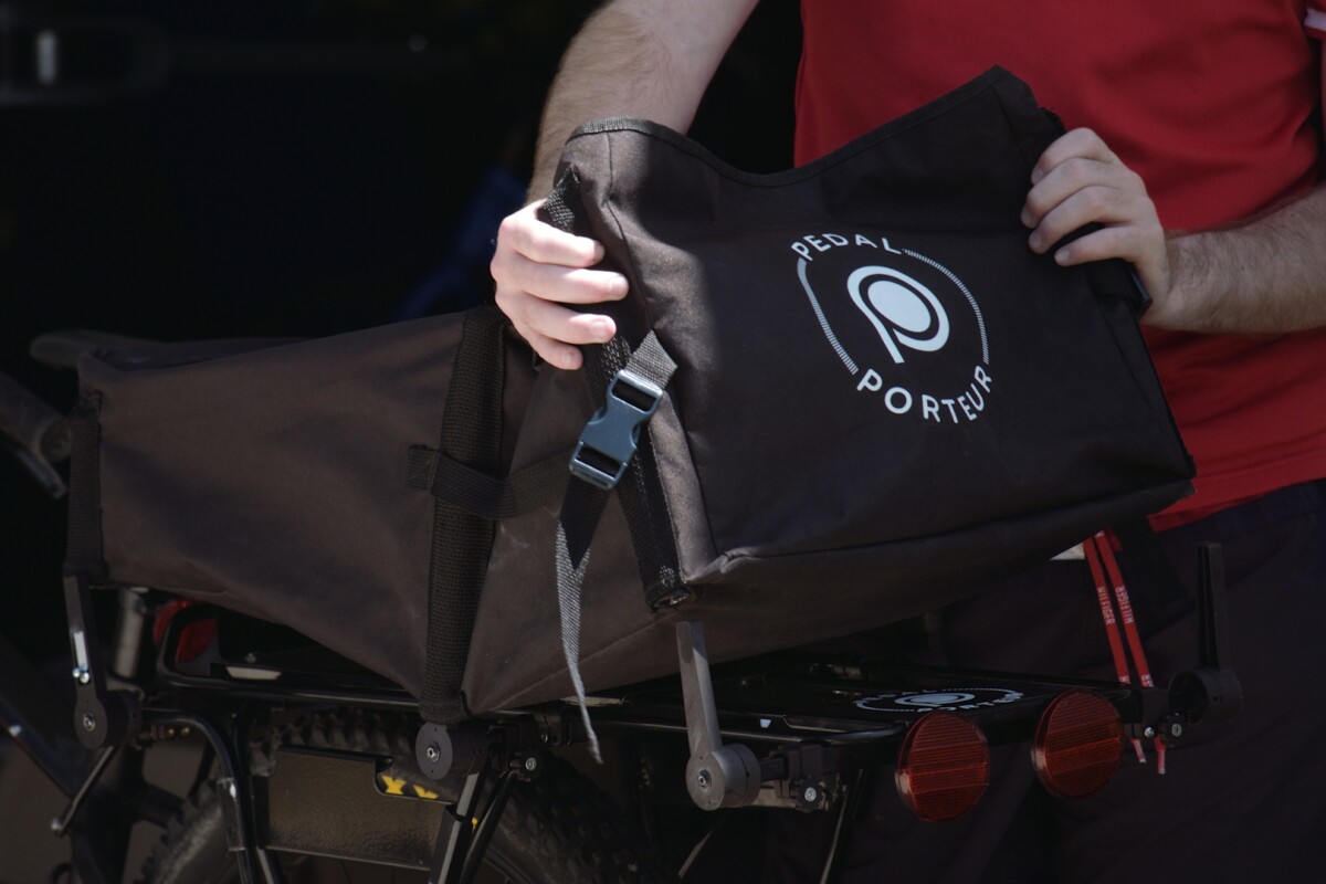 The PedalPorteur (pictured here with its "Bagsket" being installed) is presently on Kickstarter