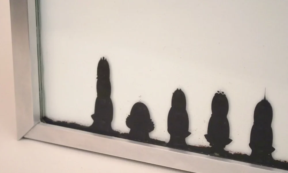 Ferrolic features a basin of ferrofluid which rises from the bottom of the display to form the time