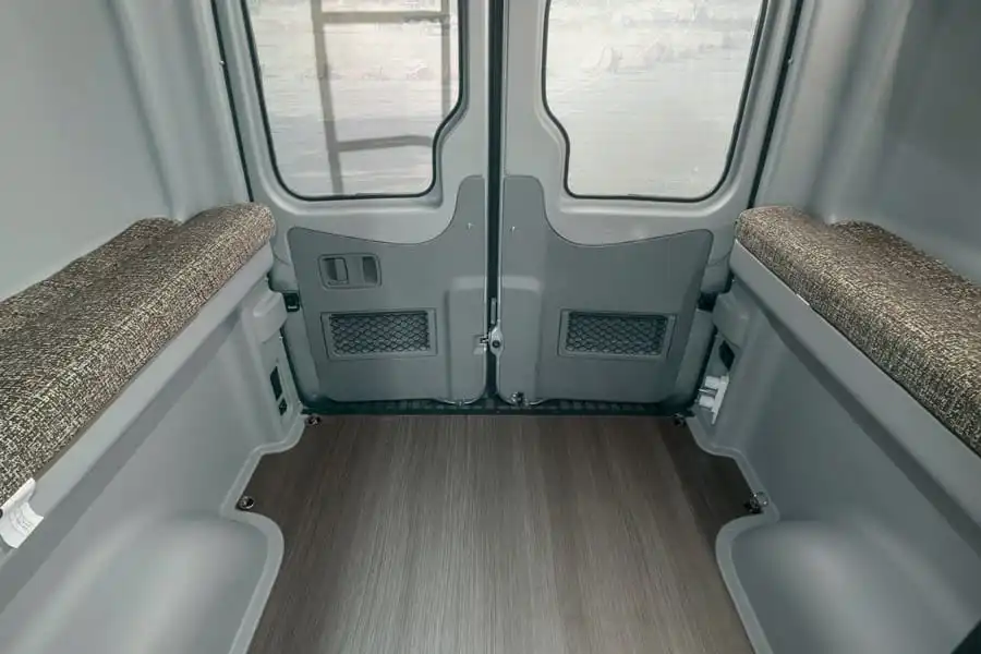 When the bed lifts out of the way, the Winnebago Revel offers plenty of room for bikes and other gear