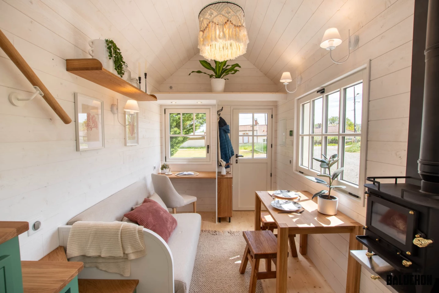 The Hytta's living room includes a sofa bed and a small work/study area