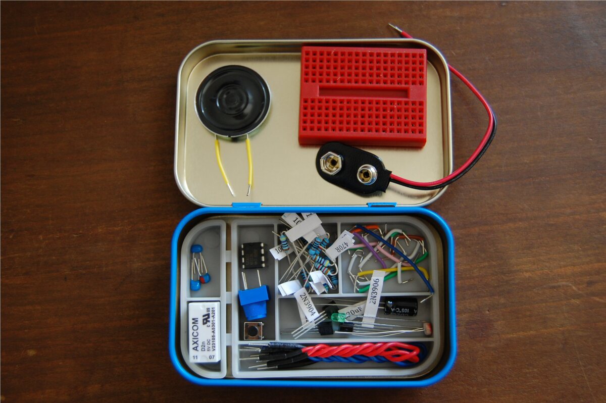 Inside the box - a plastic tray containing all the components needed for the projects outlined in the three instruction booklets, a breadboard and a battery connector