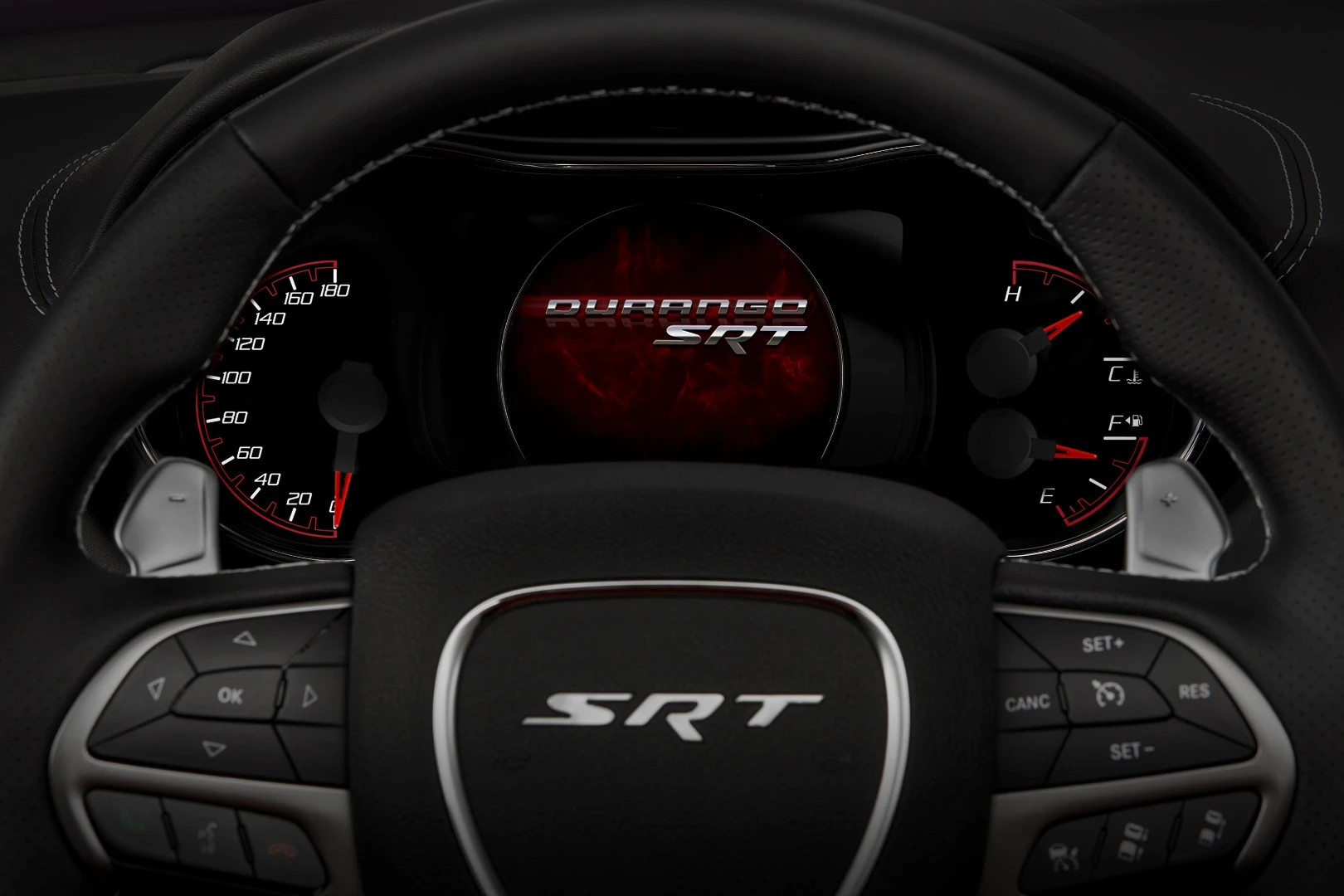 The instrument panel includes a 180-mph speedometer