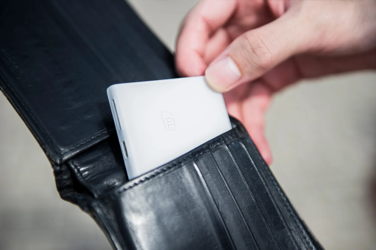 Piece is about the size of a credit card, and designed to fit inside a user's wallet or purse
