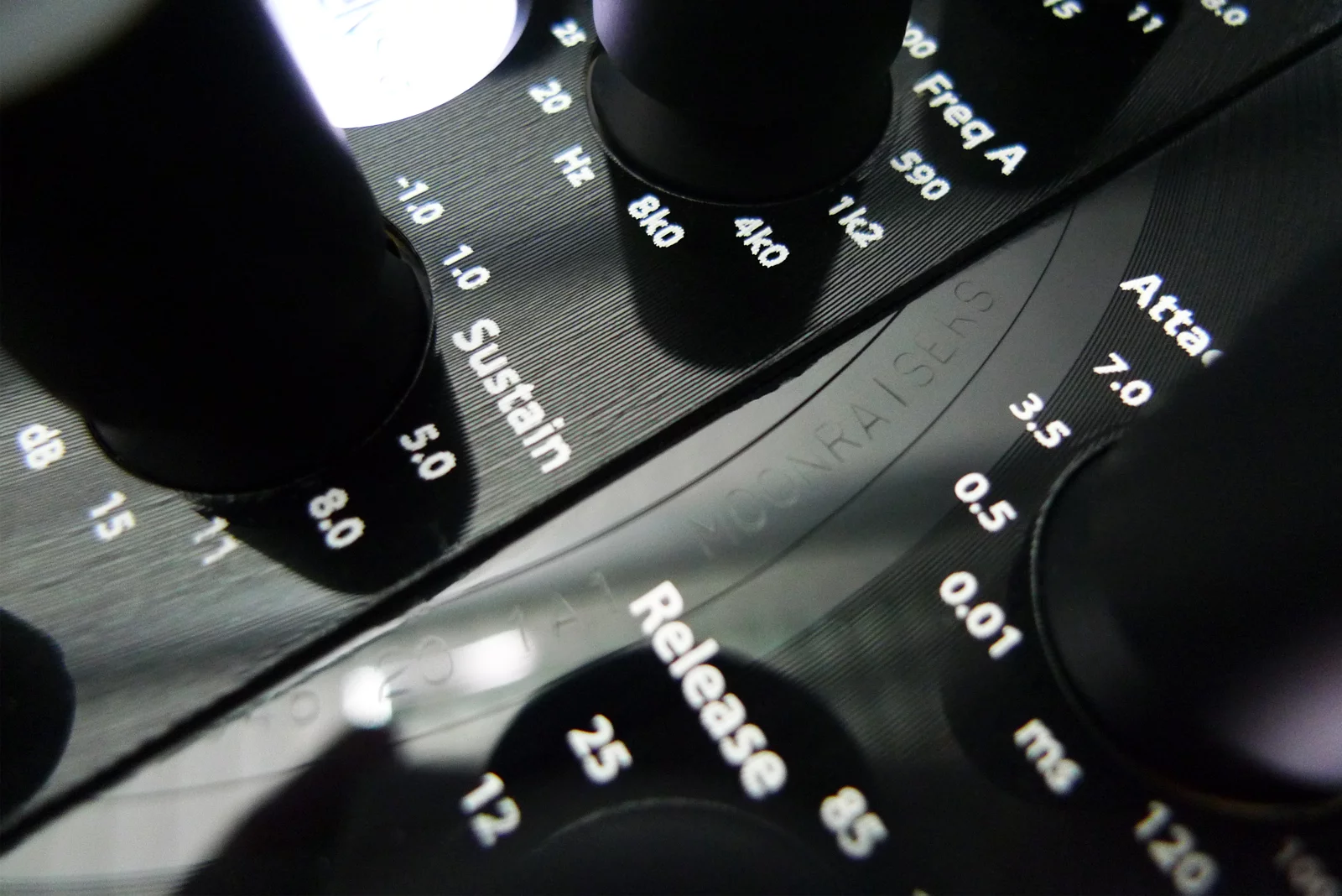 Close up of the front panel shows the vinyl grooves from the vinyl record used to make it