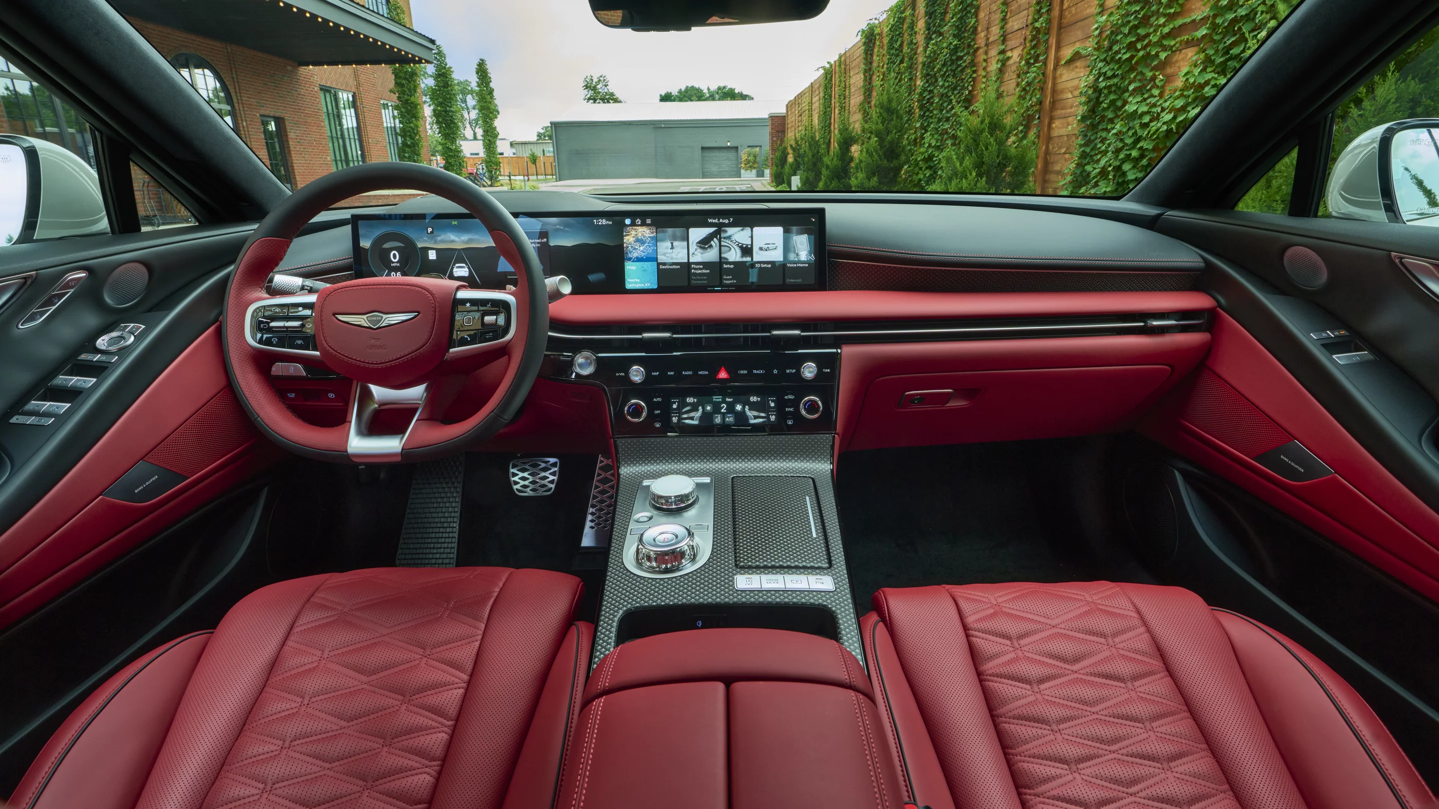 Despite the huge size of the combined driver information and infotainment display, it doesn't dominate the 2025 Genesis G80's interior
