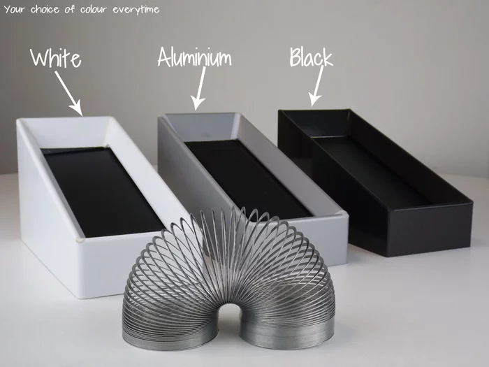 The three color choices of the Never Ending Slinky Machine