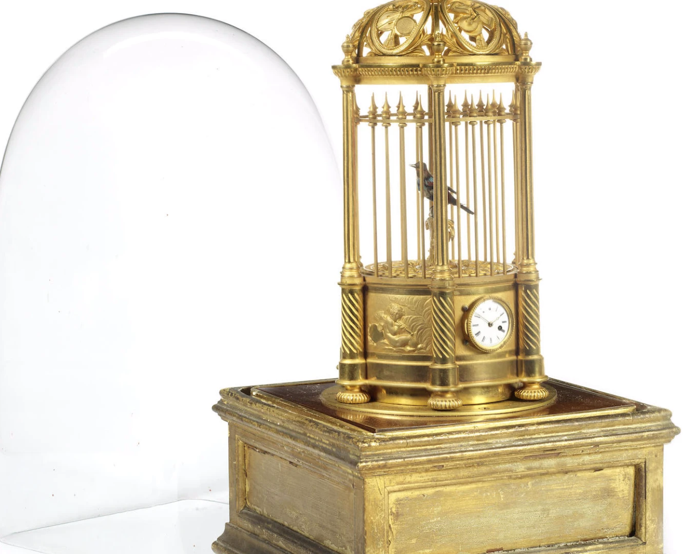 An automated singing bird cage complete with feathered bird and wing and tail movements from late 19th century France is expected to sell for at least US$4,500