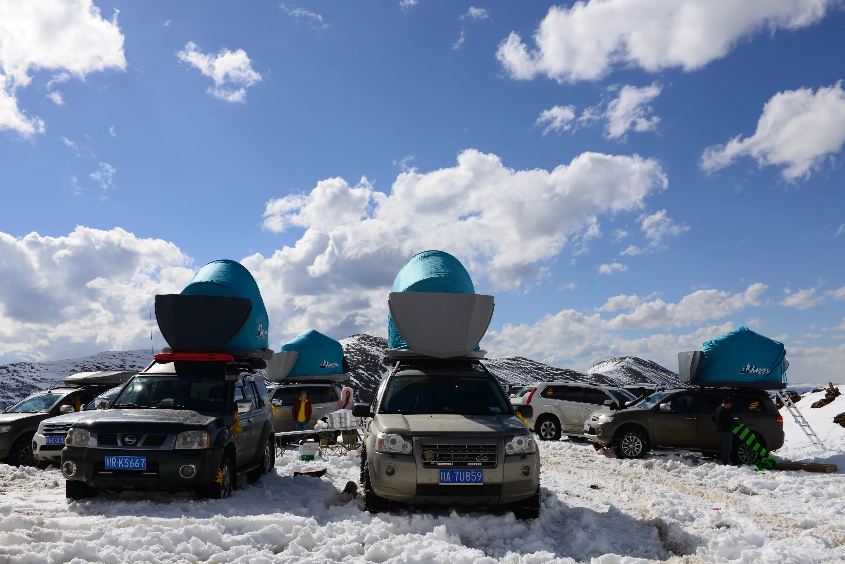 We'll bet they're glad they don't have to pitch their dome tents on the ground