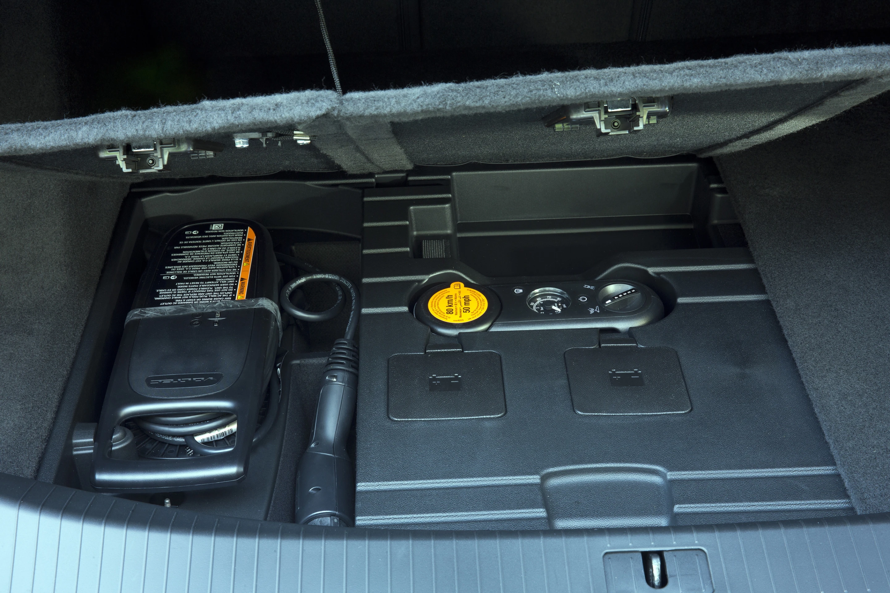 Battery and charger in rear