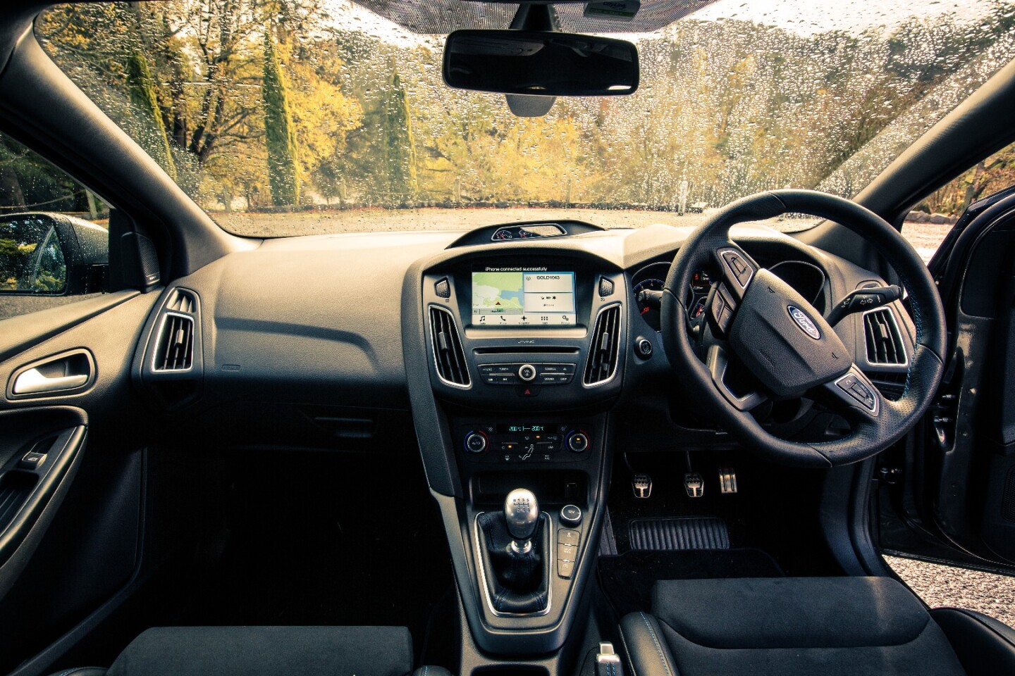 It's almost entirely standard Focus behind the wheel of the RS