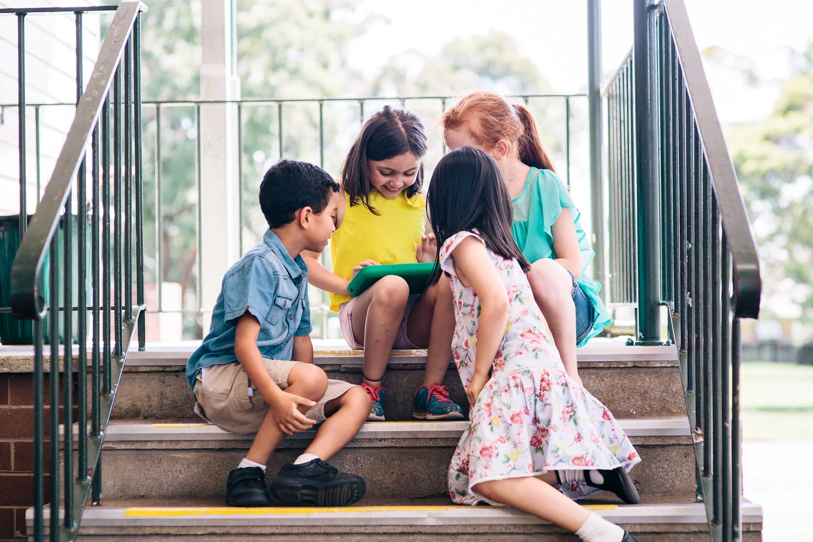 The working prototype of One Education's colorful chunky 2-in-1 laptop boasts a 7,000 mAh battery module for portability