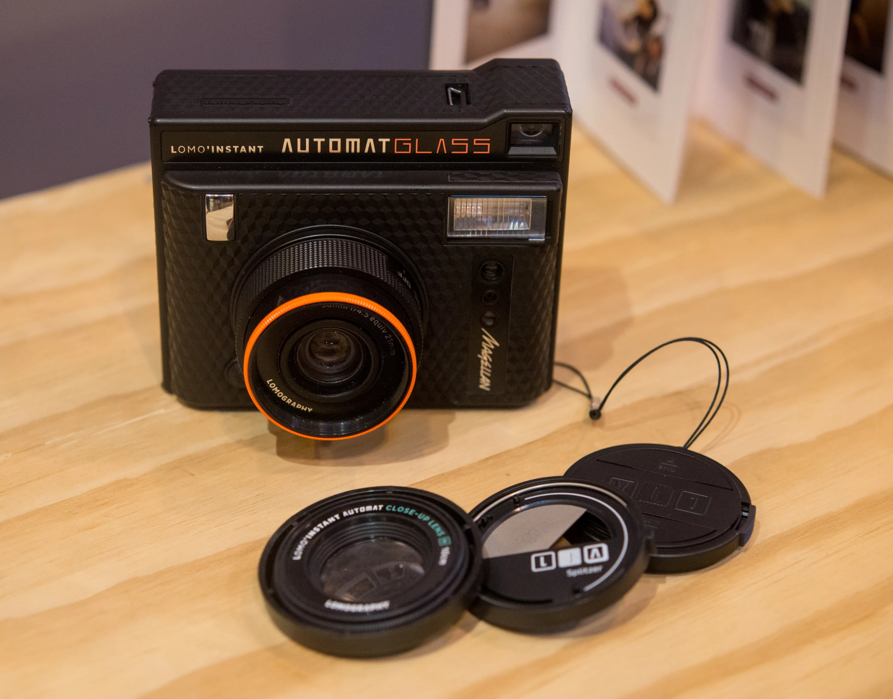 The Lomo'Instant Automat Glass Magellan will come with a close-up lens attachment, a splitzer for splitting images, and a remote control lens cap