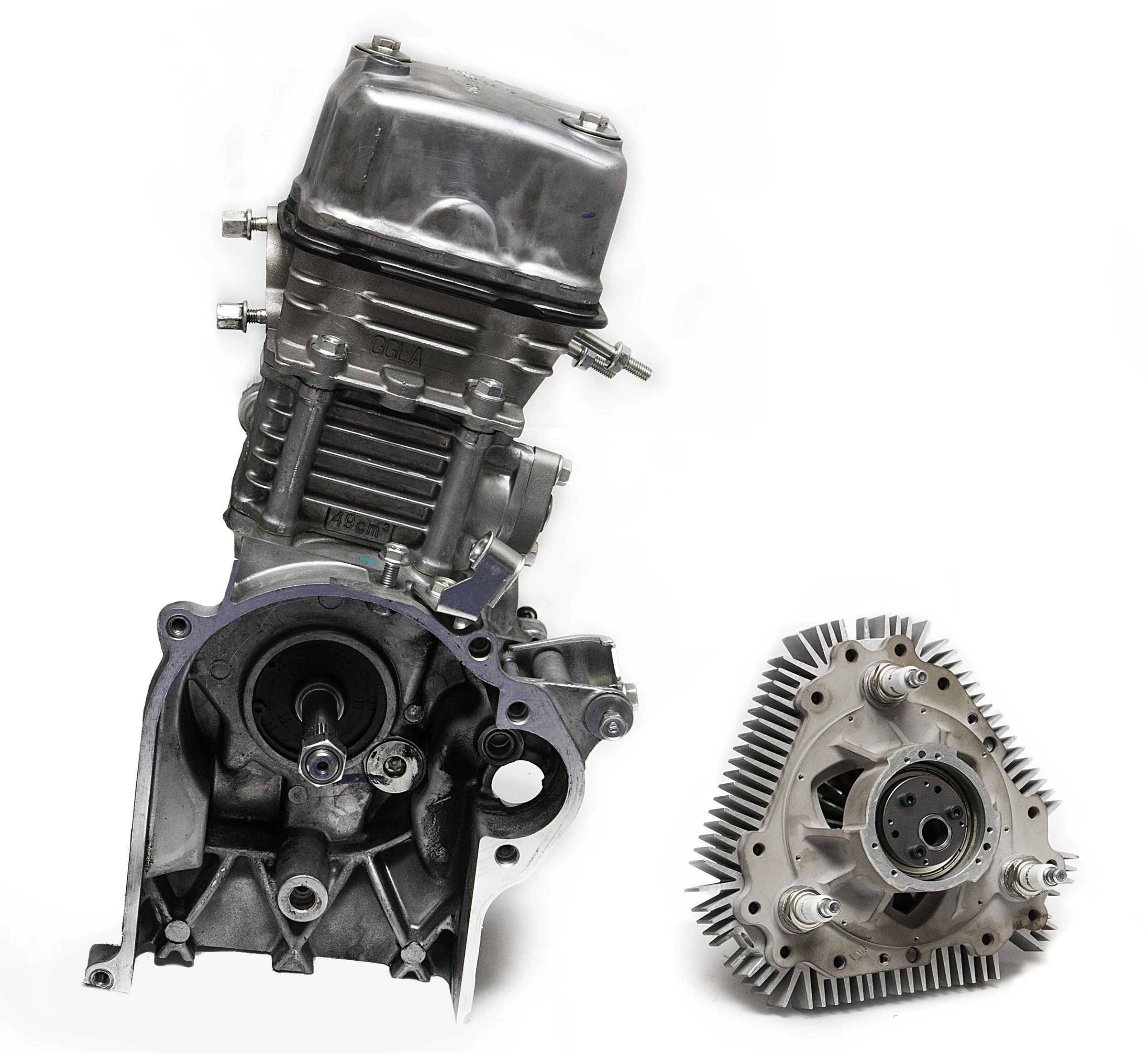 A Honda 49cc single-cylinder piston engine (left) alongside a 70cc X-Mini