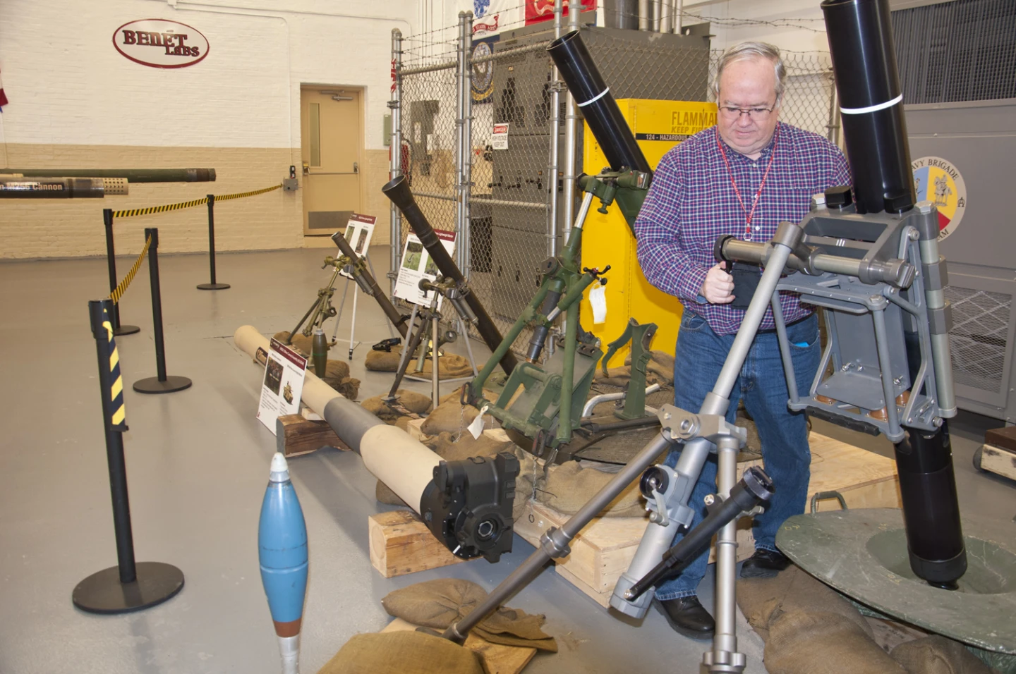 Bob Cooley, a Benét Labs Integrated Process Team leader, adjusting the newly redesigned 120-mm mortar bipod