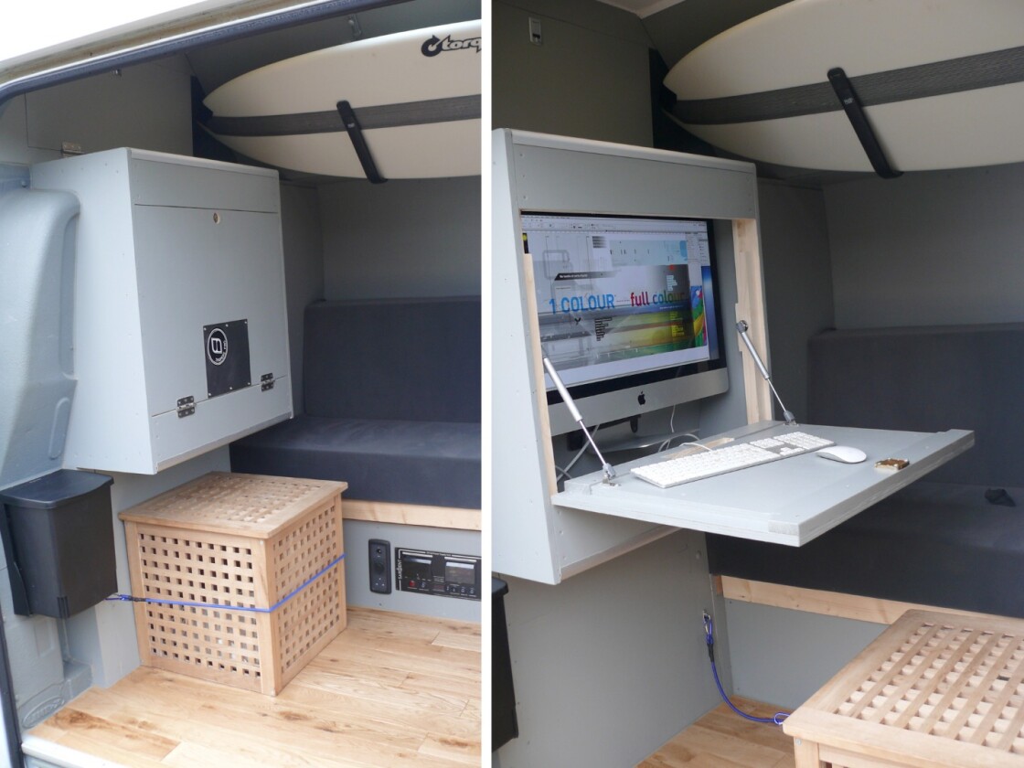The highlight of Clarke's build is the streamlined office area, a computer cabinet that drops down to work as a desk