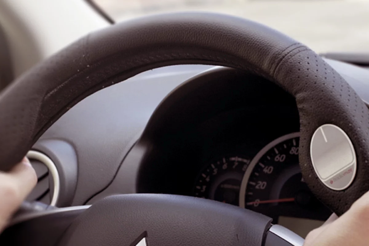 The Radiomize steering wheel cover features a touchpad for wireless control of the driver's smartphone