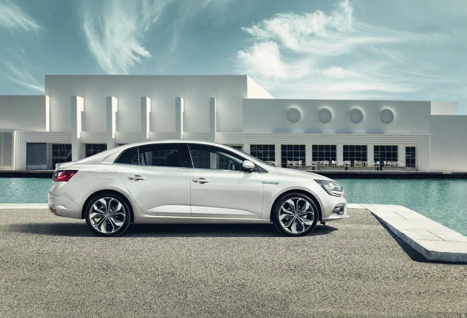 The Megane Grand Coupe has the same c-shaped headlamps as the hatchback