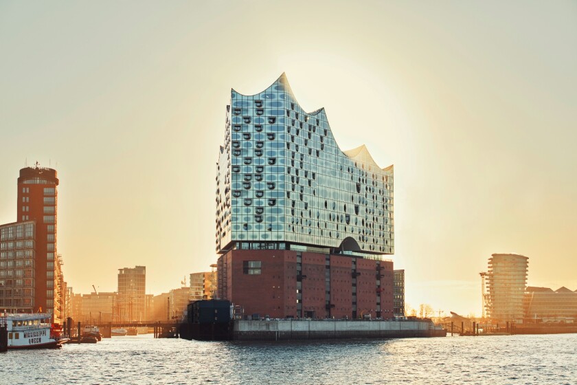 The roof covers 7,000 sq m (75,300 sq ft) and is replete with 6,000 "shimmering giant sequins."
