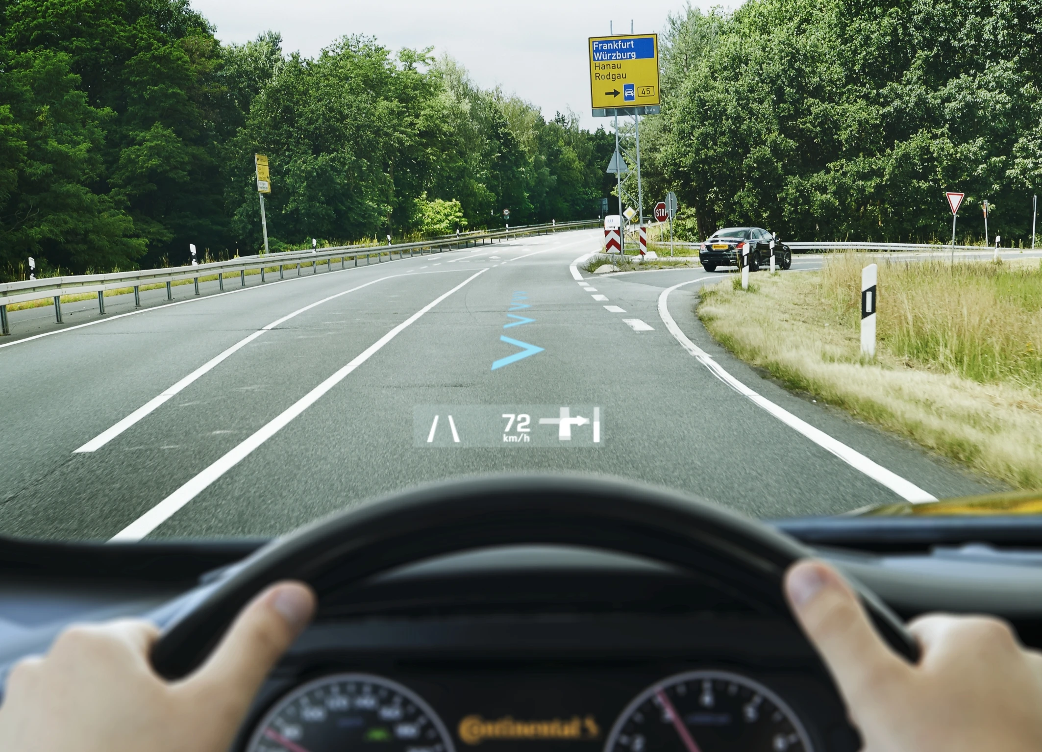 As part of the AR-HUD system, navigation symbols are displayedin the forward field of view