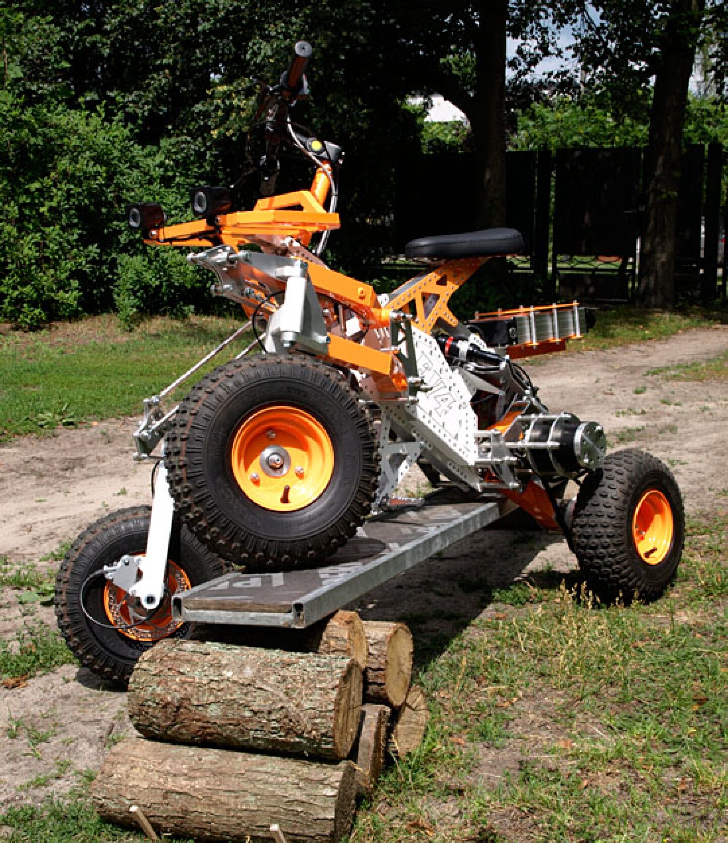 Tilting electric quad gets menacing offroad big brother