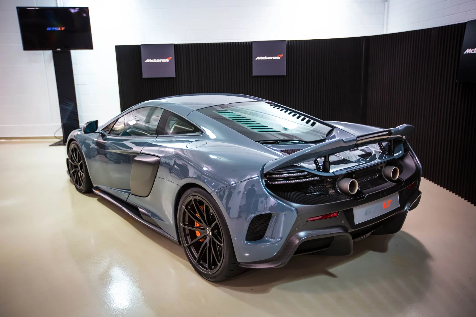The mesh at the back of the car gives onlookers a peek at its inner workings