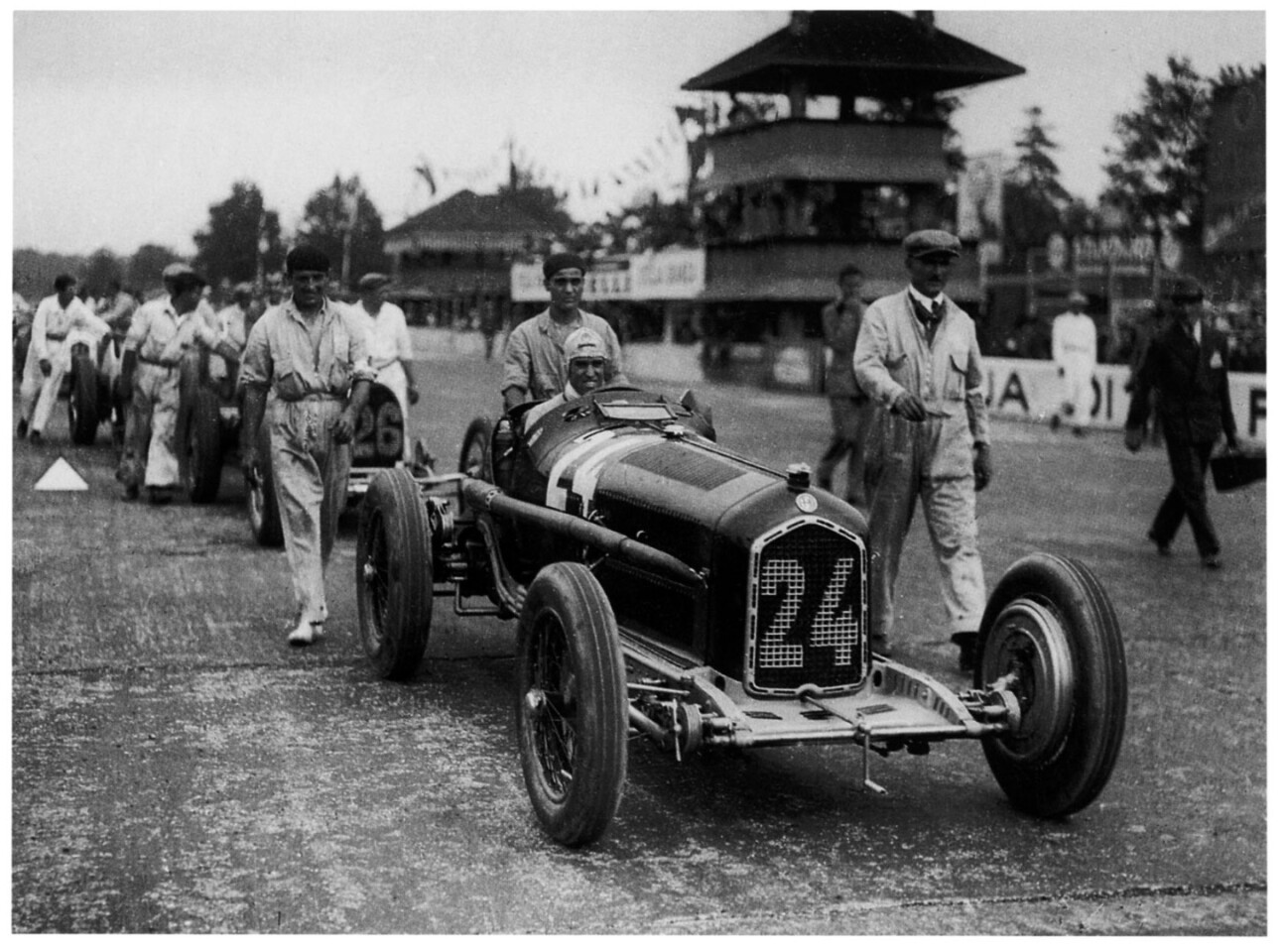 Tazio Nuvolari is pushed onto the grid