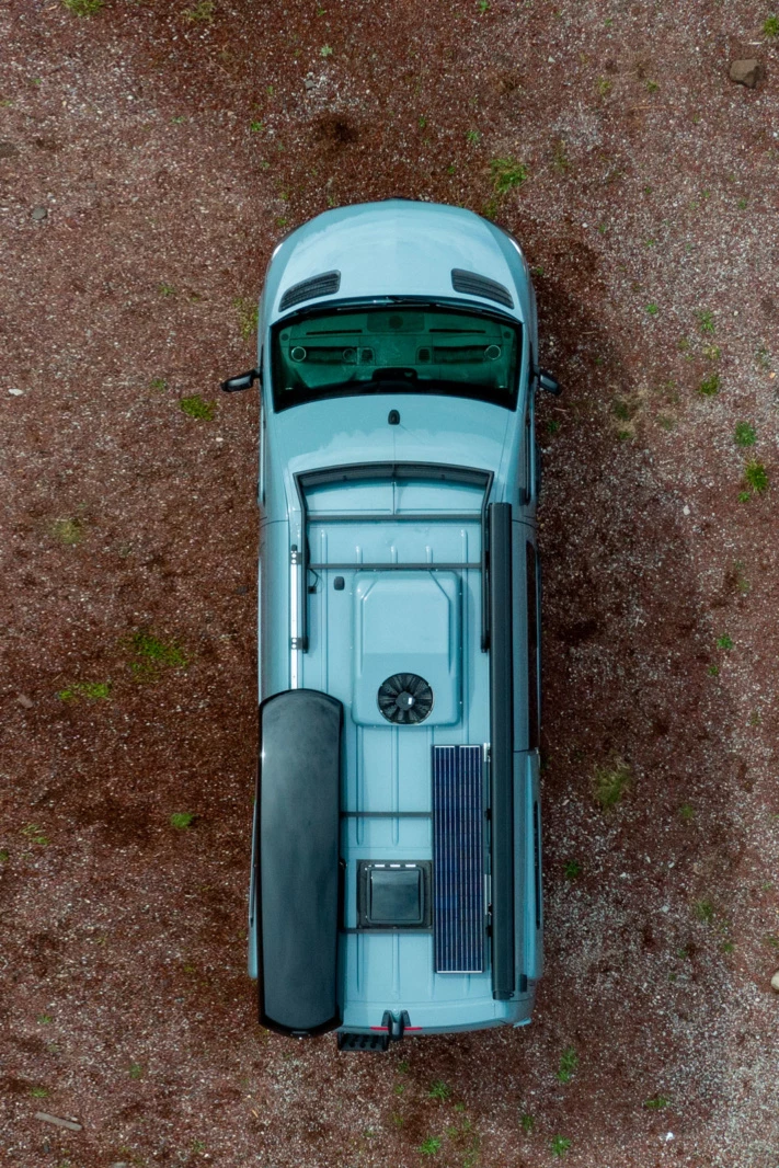 The Outside Blue Sky includes a roof-mounted solar panel, awning and cargo box