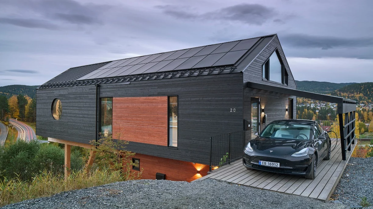 The house not only generates enough energy for its own running needs but also supplies 75 percent of the energy required for charging the family's electric car