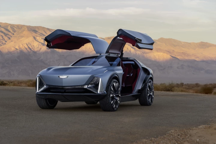 View of the Cadillac Elevated Velocity concept in Vapor Blue with the gull-wing doors open
