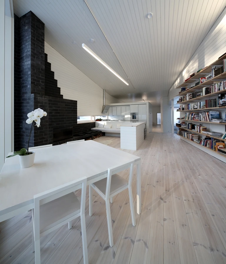 Apelle house is a basic family home with multi-functional living zones and a strong connection to the surrounding environment