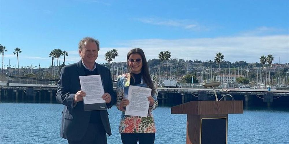 AltaSea CEO Terry Tamminen and EWP's founder/CEO Inna Braverman sign the collaboration agreement for the pilot wave energy system at the Port of LA