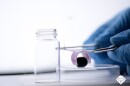 The prototype device is used to lift a delicate blueberry
