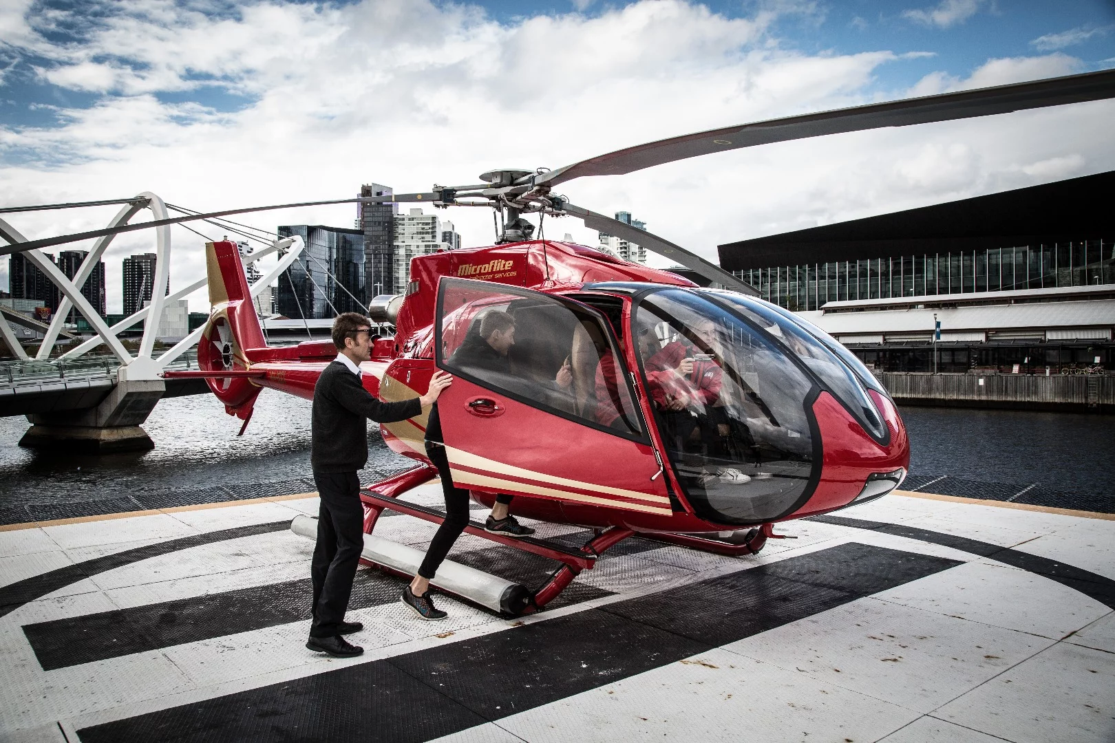 Scott steps into the helicopter courtesy of McLaren Australia