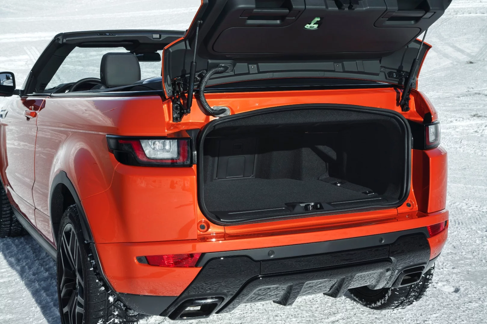 Trunk space was designed to stay the same, regardless of the position of the convertible top