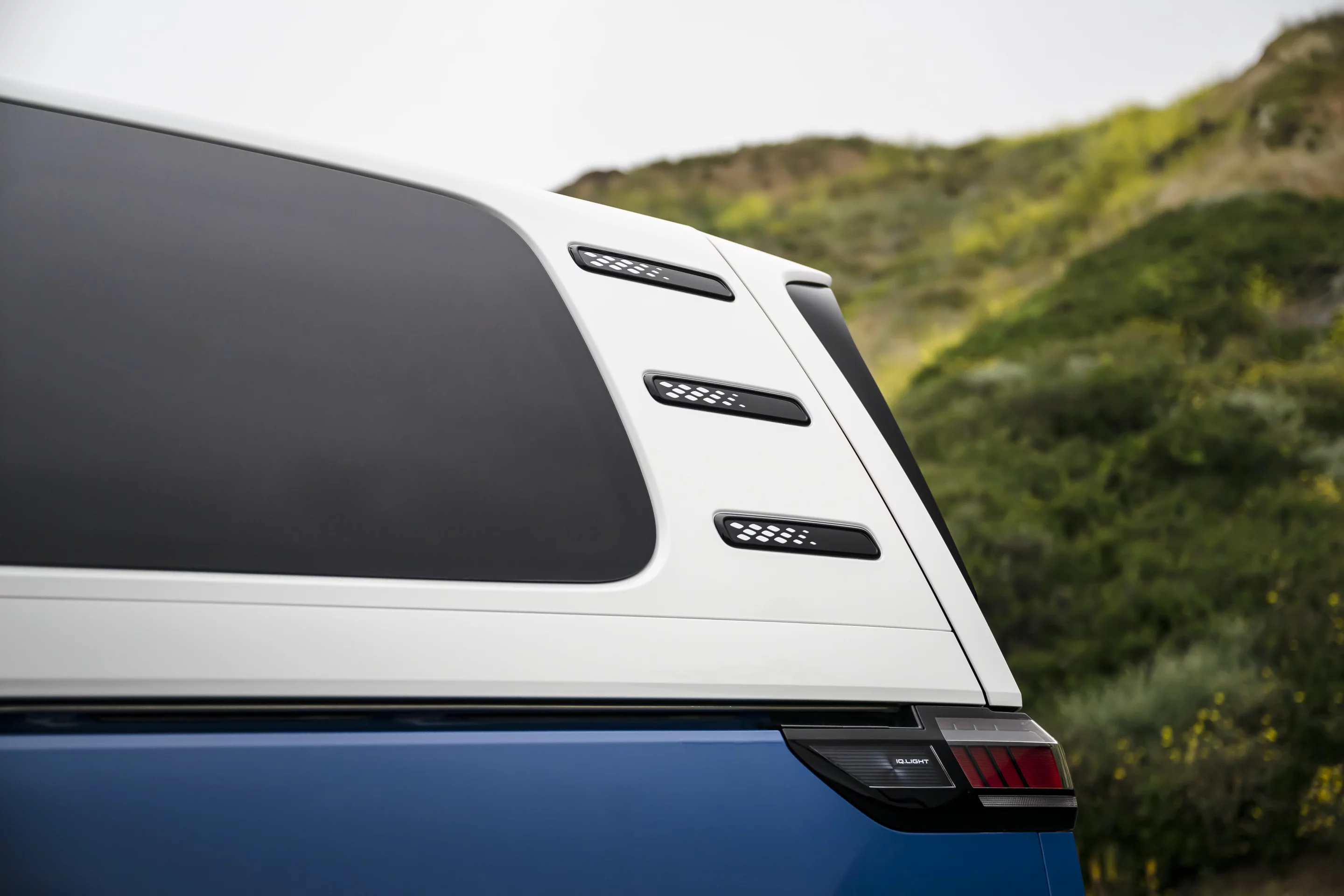 The "air vents" on the D-pillar are inspired by the air cooling slots on the original rear-engine Type 2s