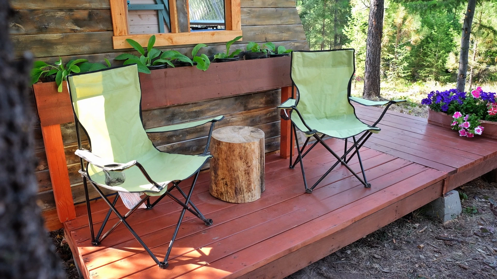 The exterior includes chairs and hammocks