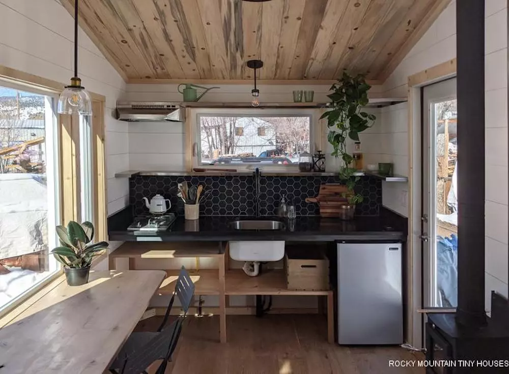 The Boulder 2.5 has a basic kitchenette that includes a fridge, sink, and two-burner propane-powered stove