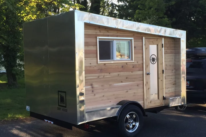 The Drifter sits on 15-inch wheels and is finished in marine-grade aluminum and cedar wood