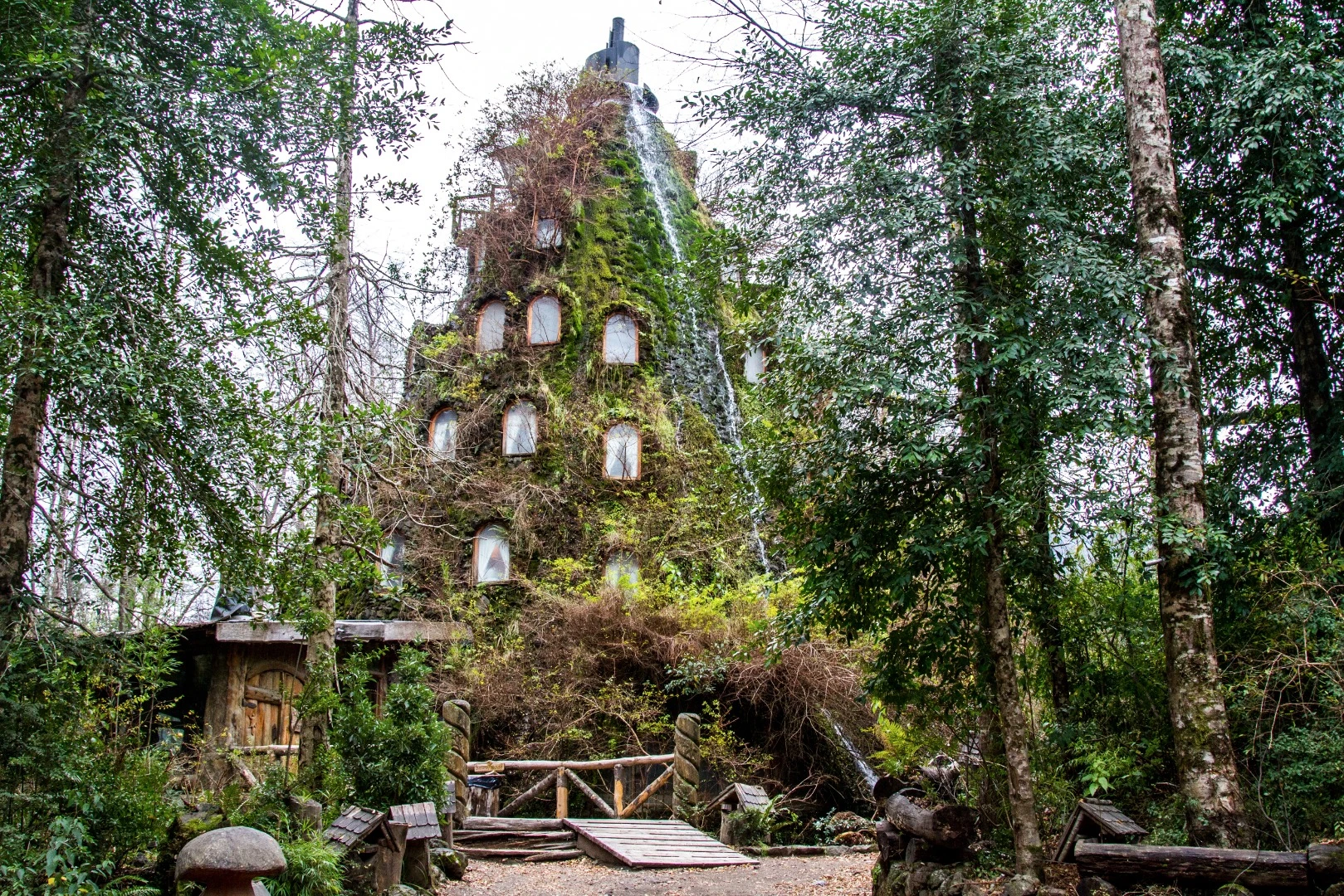 Huilo Huilo's strangest offering is a cone-shaped hotel spouting a continuous stream of water that cascades down its shrubby exterior