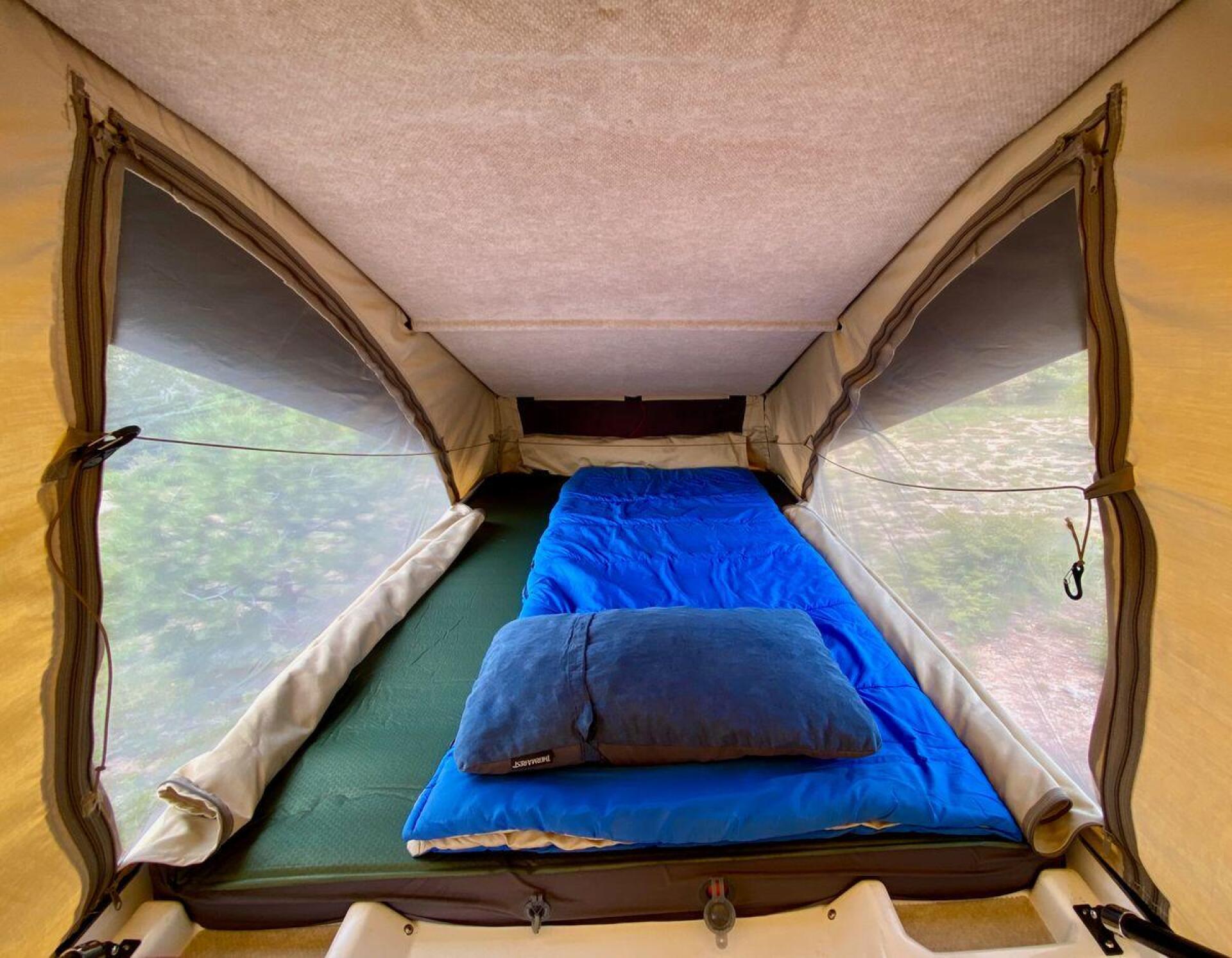 Hatchet hacks Jeep Wrangler into poptop overland microcamper