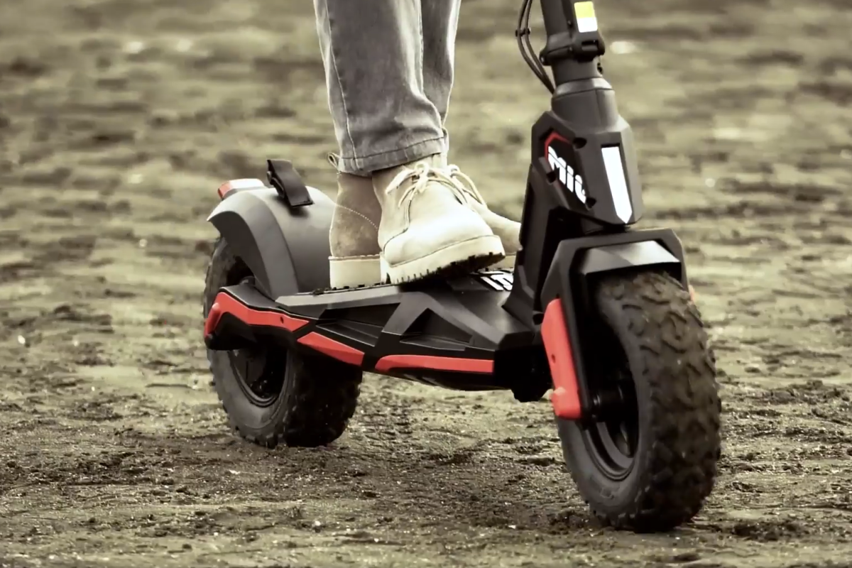 Mig E Kickscooter Rolls On Fat Tires To Tackle Road Or Dirt