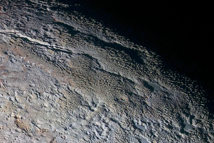 High resolution image of the Tartarus Dorsa mountain range spanning 330 miles (530 km) across